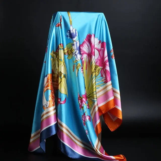 Elegant silk scarf featuring a stylish leopard print pattern, perfect for fashion-forward accessories.