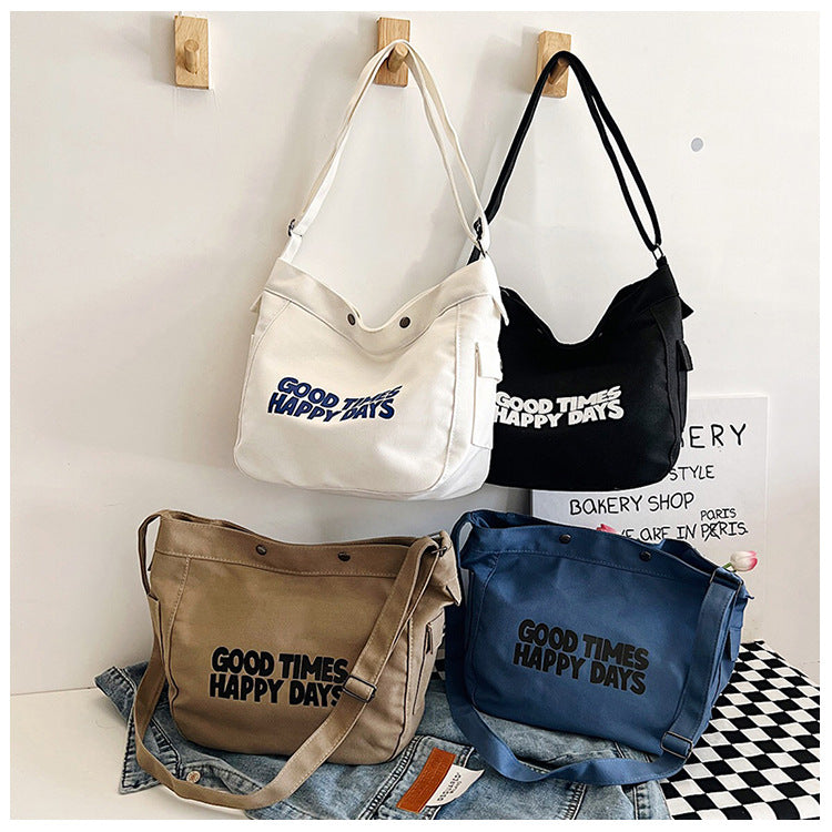 Letter canvas bag, women's new trendy tote bag, student class large capacity crossbody bag.
