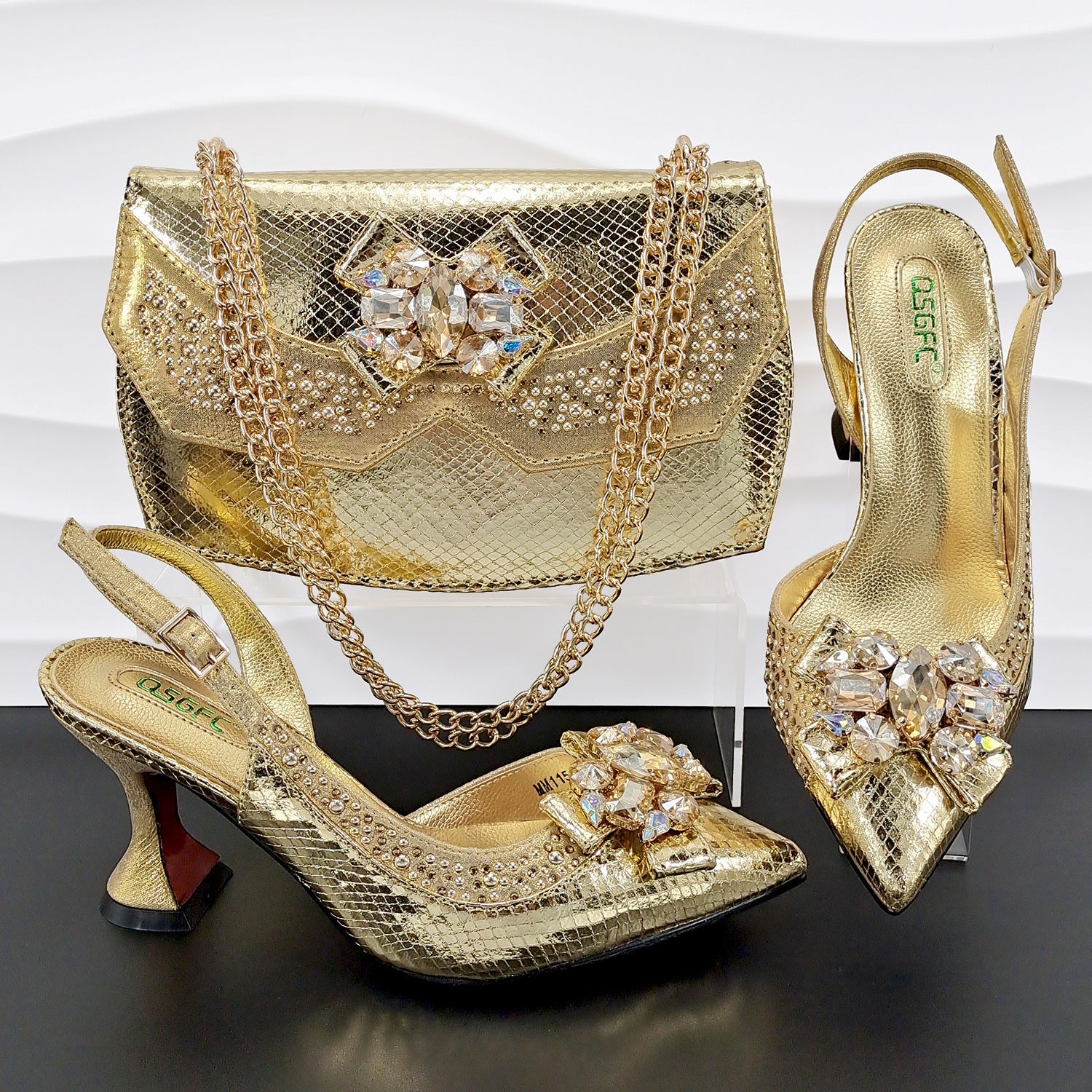 Le Bourse – Élancement structuré, finition soirée - Gena Campbell