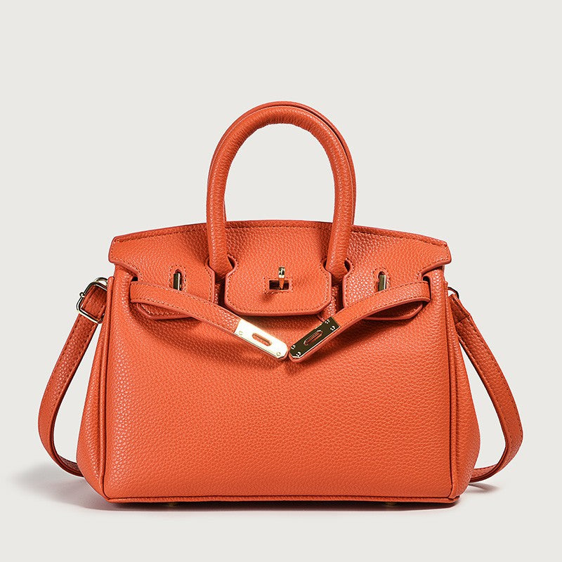 Sac Chardon-Lagache en cuir synthétique orange – poignée rigide et format compact