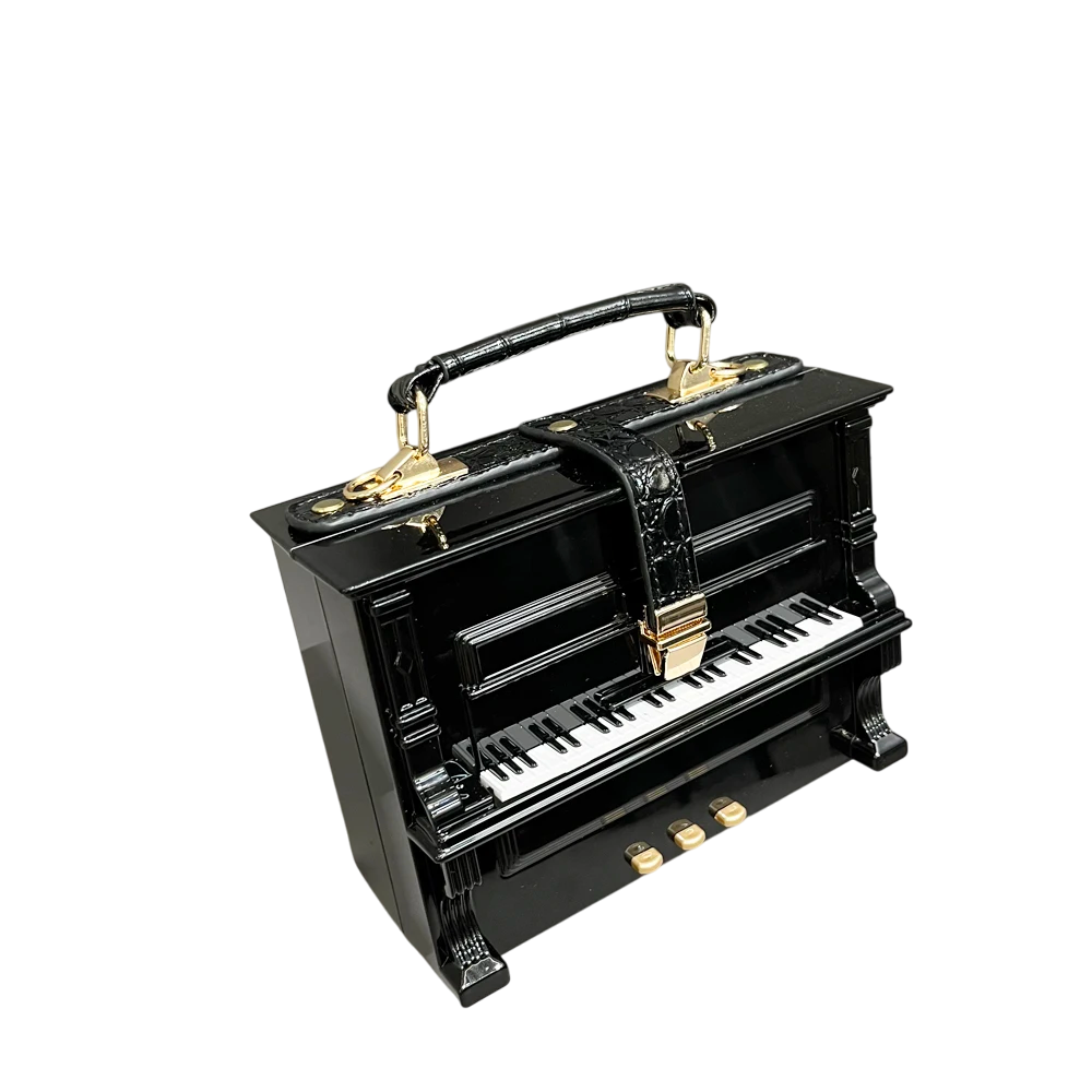 img_src_sac-piano.jpg_alt_Sac_main_de_luxe_en_cuir_design_piano_bandouli_re
